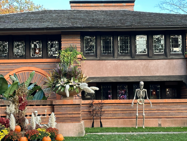 The 12 foot skeleton in front of the arthur heurtley house
