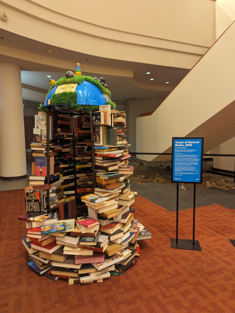 The Tower of Banned books, a sculpture composed of a cylinder of stacked banned books.