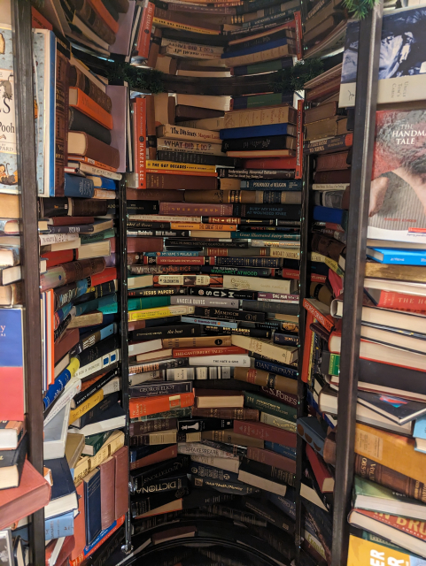 The Tower of Banned books, a sculpture composed of a cylinder of stacked banned books.