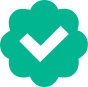 a checkmark on a green background the shape of a flower or cloud. 
