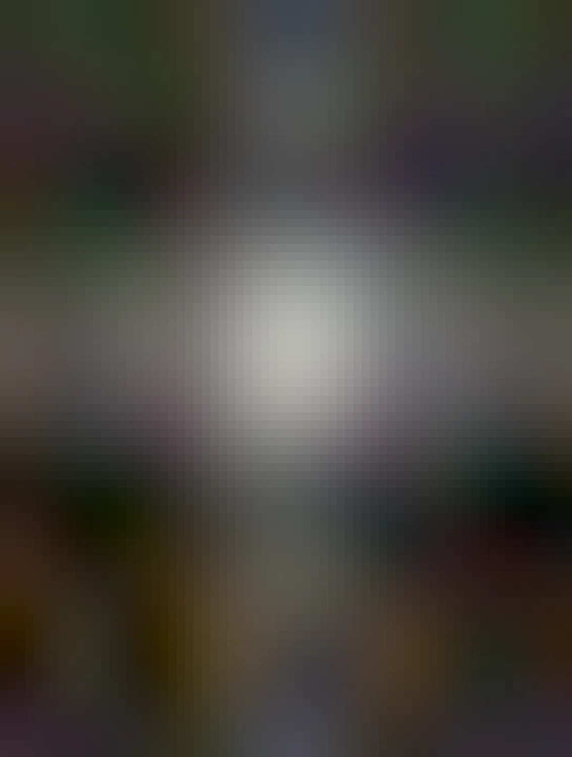 pouličná lampa a v jej svetle sneží