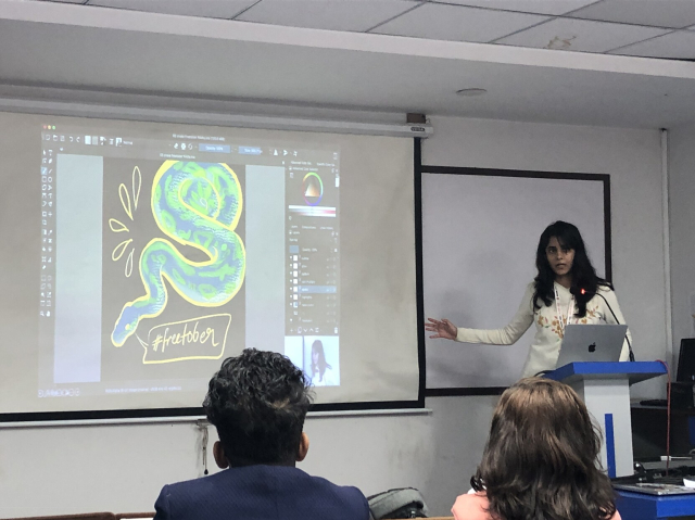 Nikita shows the creation process for a Python illustration in Krita.