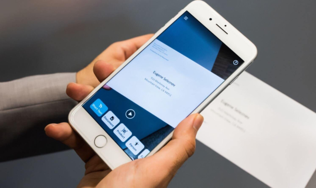 An iPhone scans a document using the short text feature on Seeing AI