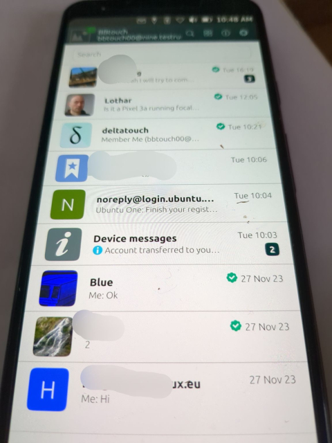 Pixel3a phone with UbuntuTouch operating system and running DeltaTouch app showing a chatlist with Lothar, a deltatouch group, a registration chat with ubuntuone, and some other chats. 