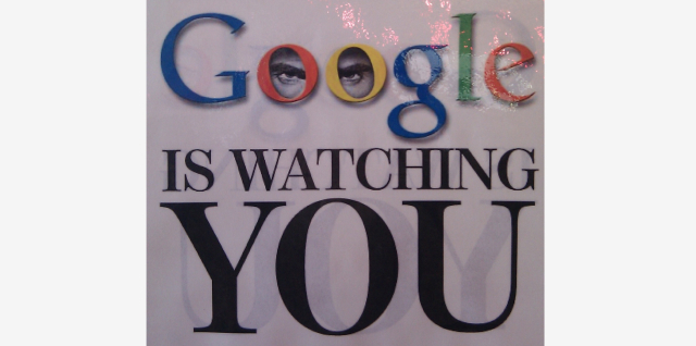 Picture with eyes behind the two Os in the text: Google is watching you
