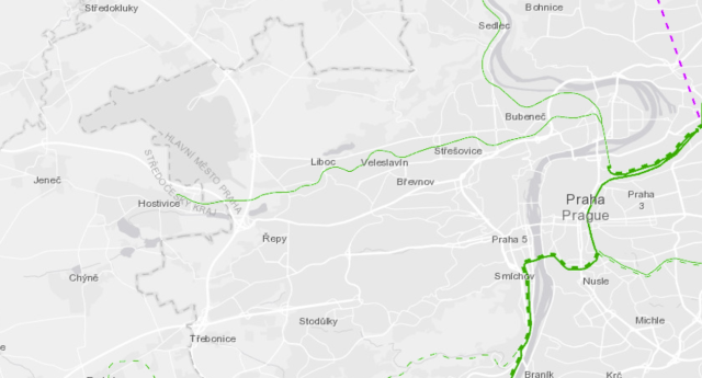 Excerpt from a grey map showing some railway lines in green (and purple). It is focused on the line heading west out of Praha to Hostivice and ending there.
