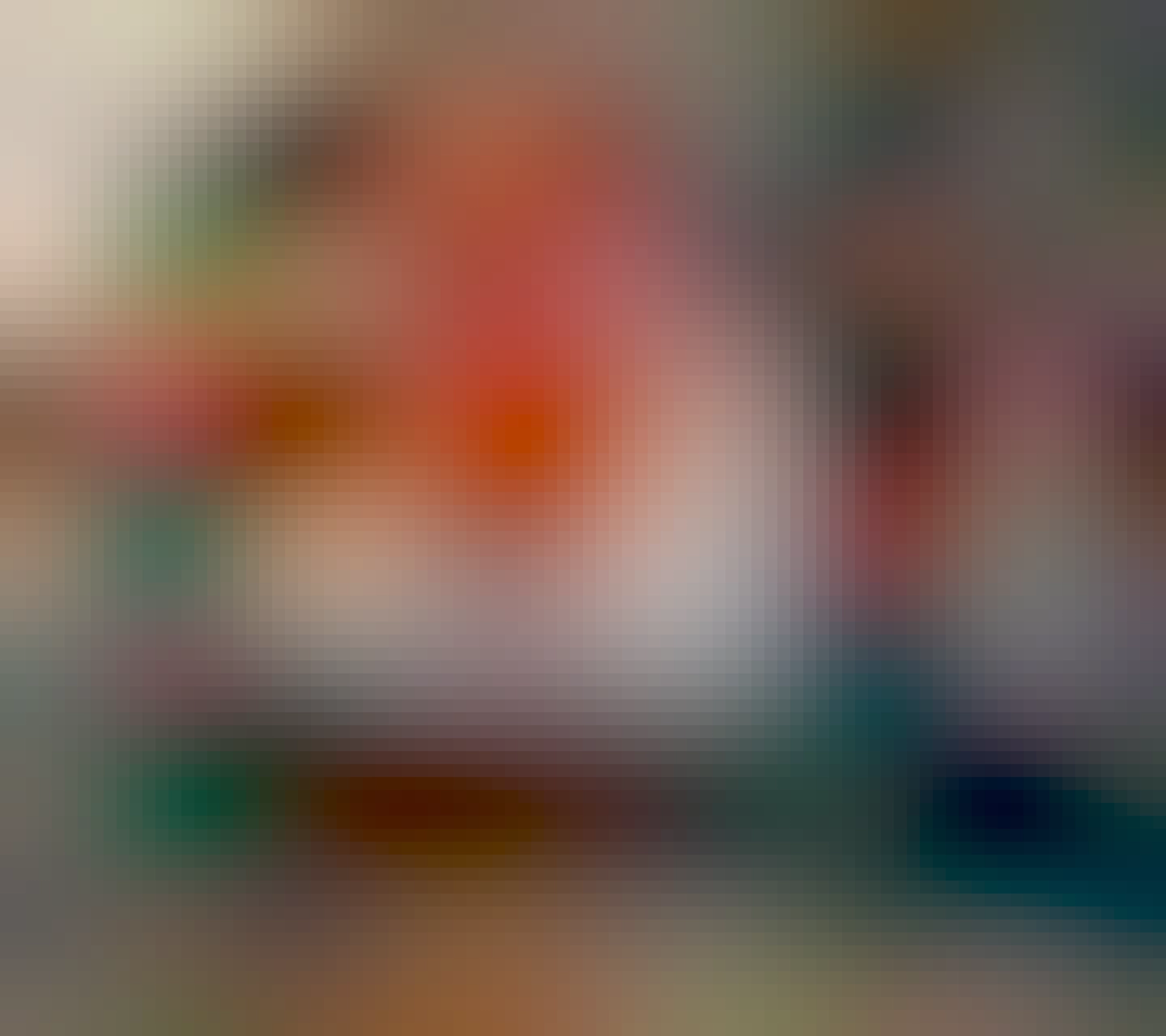 a jumbo-sized 4x bigger than normal mechanical keyboard switch in an enclosure built from lego, on my desk looming next to a normal-sized keyboard; the bright orange jumbo keycap has googley eyes