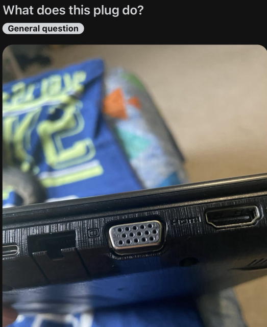 A person posted a question on the internet forum with a picture of their laptop asking, “What does this plug do?” The plug-in question is the VGA port. 