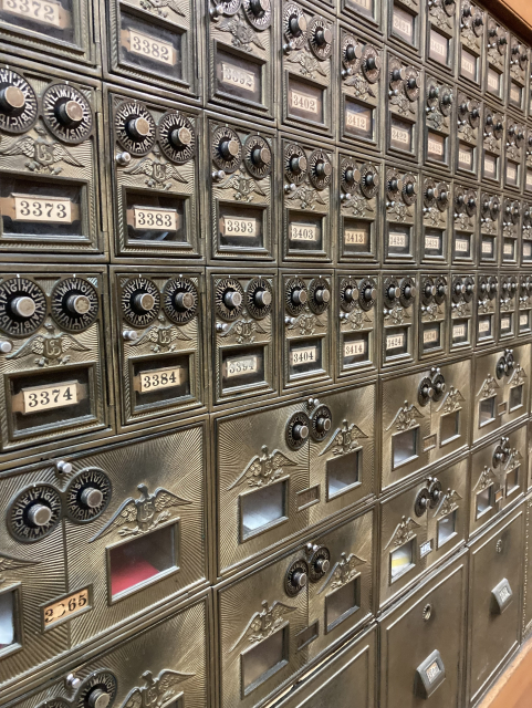 Wall of brass mail boxes