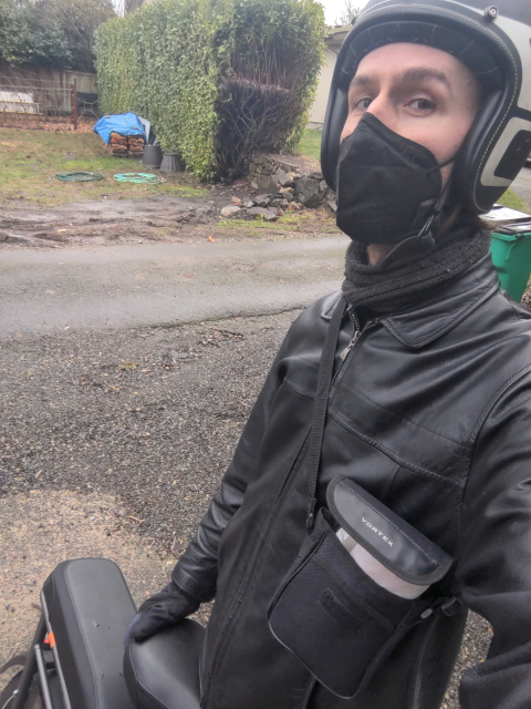 it's me, I'm wearing a binoculars case with a bahn mi sticking out of it