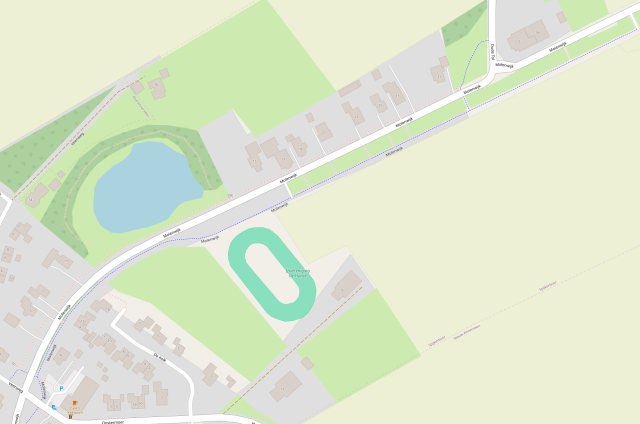 Map during mapping: smoother roads, some grass around doors, parking mapped as area and driveways visible
