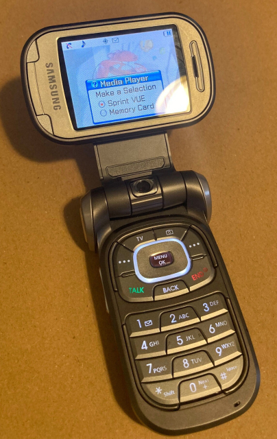 A Samsung SPH-M250 prototype flipped open with the screen swiveled horizontally.
Above all else, expect to see something related to old mobile phones here!