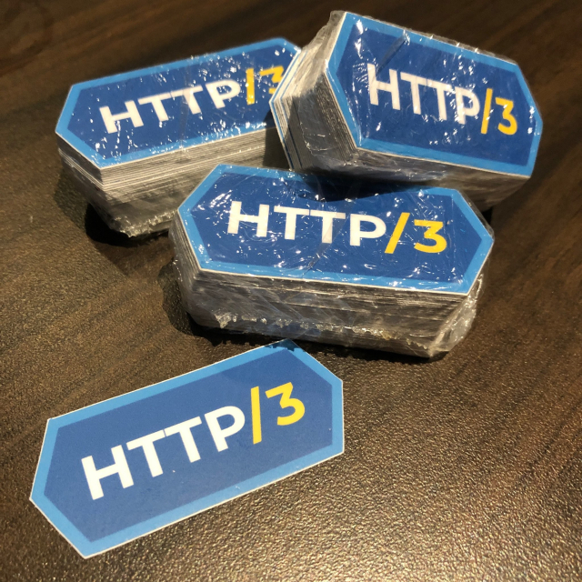 Lots of stickers with the HTTP/3 logo