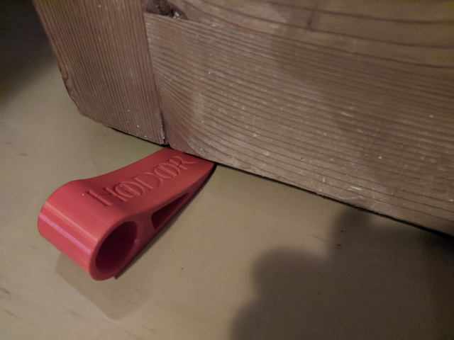 3d printed door stopper with the word hodor written on it in a game of thrones font