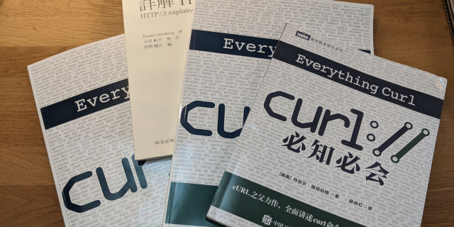 A photo of some books: everything curl in English and Chinese and a HTTP/3 explained in Japanese.