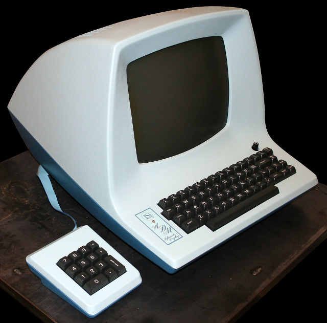 picture of a ADM-3A terminal, whose keyboard arrangement is believed to be the origin of the using-tilde-as-home convention.