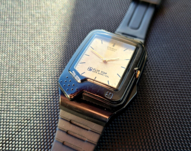 a photo from an ebay listing for a casio flip top databank model FTP-30. the photo shows the top of the watch with the lid closed
