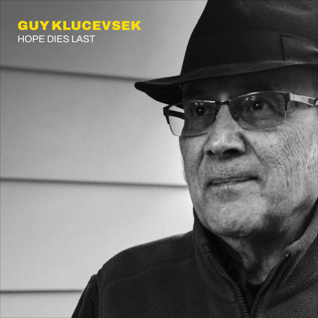 Cover of Guy Klucsevsek’ Starkland album “Hope Dies Last”, featuring a black and white photo of Klucevsek wearing a hot in half profile.