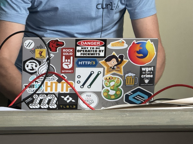 photo of bagder's laptop stickers