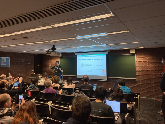 Mike Gifford presenting on the utility of automated tests, in audits, and when to use manual interventions too