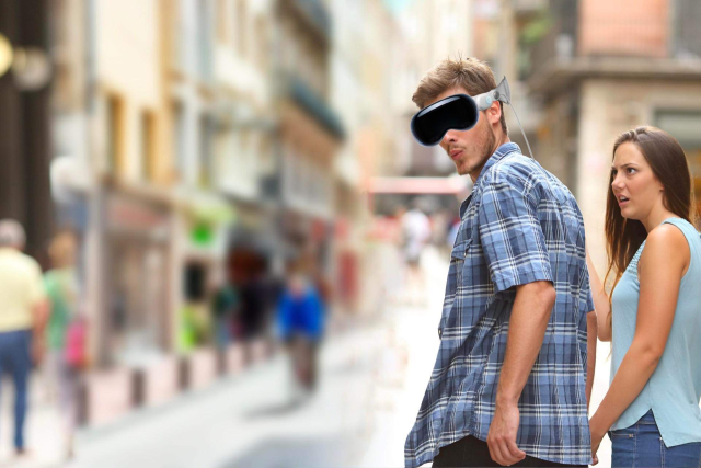 Variation of the Distracted Boyfriend Meme
The boyfriend is wearing Apple Vision Pro VR headset. He’s turning to look at the girl…who isn’t there. Perhaps it’s the woman in red?