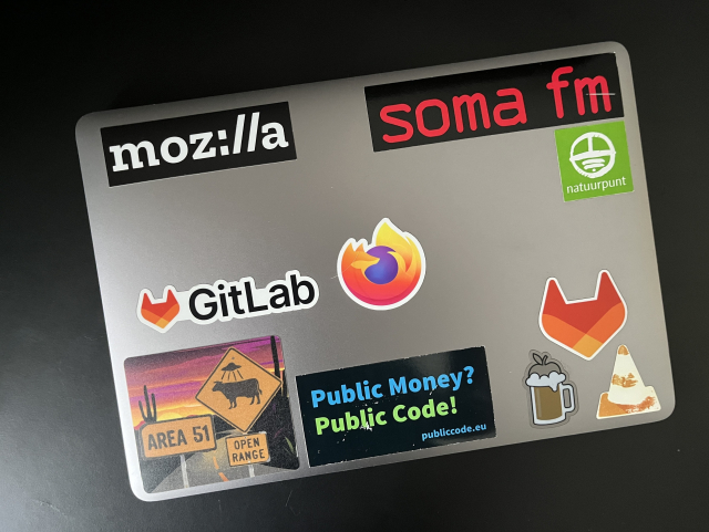 Laptop lid without a Thunderbird sticker (but with stickers from Mozilla, SomaFM, Firefox, Gitlab, ...)