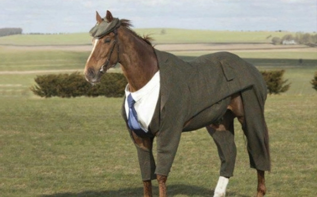 Here is Morstead, wearing the tweed suit.