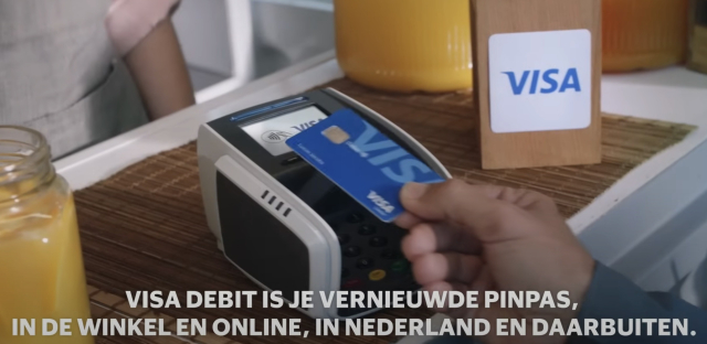 A screenshot showing contactless VISA card paying on Atos Yomani terminal the wrong way, not approaching the NFC reader on the left.