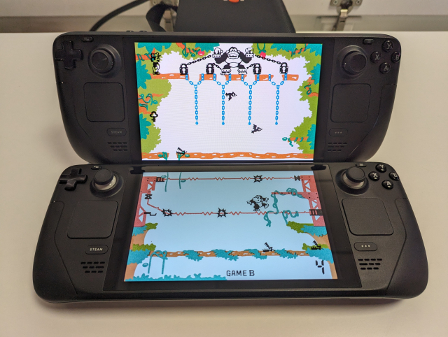 Two Steam Decks side by side showing the split-screen Game & Watch Donkey Kong II game, with one screen on each Deck