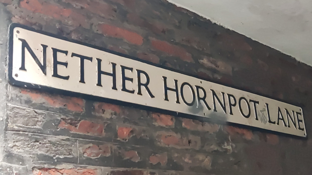 A street name sign from York, reading "Nether Hornpot Lane"