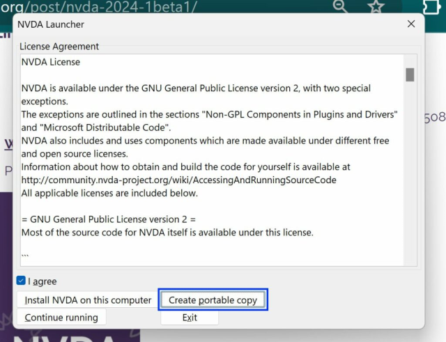 Screenshot of the NVDA launcher window showing the license agreement. Of the four action buttons, the "Create portable copy" button is selected.