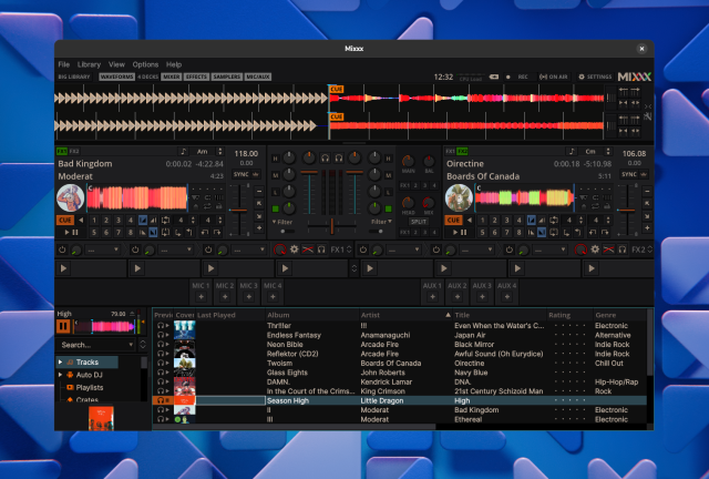 Screenshot of a Mixxx window, with waveforms at the top, lots of knobs and settings in the middle, and the list of tracks at the bottom.