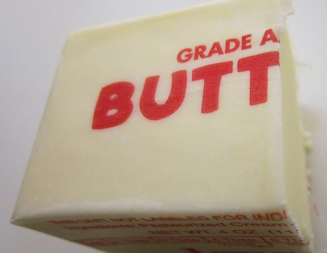 stick of butter cut in half. wrapper says "grade A butt"