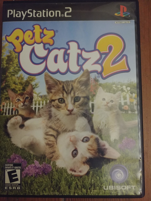 Oh my gawd.

Yes, I played it. The cover is just throw-up cute, with four kittens looking, wrestling hugging and all that.

They're in grassy field with a fence in the background and flowers and sunshine.

This was obviously targeted at a younger demographic, but hey, even marketing makes mistakes sometimes.