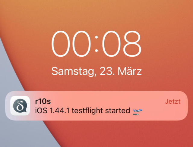 iPhone lockscreen showing a notification with the text "iOS 1.44.1 testflight started"