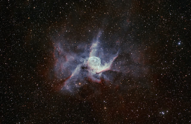 An image of the Thor's Helmet Nebula.  Captured with the following details:

Imaging Telescopes Or Lenses- Stellarvue SVX102T
Imaging Cameras - ZWO ASI2600MM Pro
Mounts - Losmandy G11
Filters: ZWO Blue 2" · ZWO Green 2" · ZWO H-alpha 7nm 2" · ZWO O-III 7nm 2" · ZWO Red 2"
Accessories: Raspberry Pi Raspberry Pi 4
Software: Adobe Photoshop · Aries Productions Astro Pixel Processor (APP) · Pleiades Astrophoto PixInsight · Software Bisque TheSkyX Imaging Bundle
Integration Times:
ZWO Blue 2": 8×300″(40′)
ZWO Green 2": 9×300″(45′)
ZWO H-alpha 7nm 2": 40×300″(3h 20′)
ZWO O-III 7nm 2": 42×300″(3h 30′)
ZWO Red 2": 9×300″(45′)