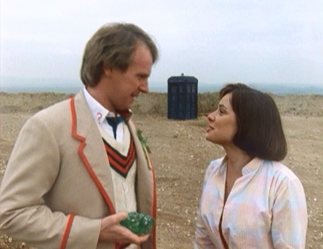 5th Dr Who Peter Davison talking to Peri Brown on Androzani Minor with Tardis in background 