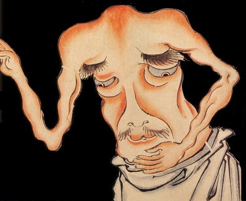 An older looking headless guy, whose flappy skin is quicering all around his arms and torso. he looks very distraught, eyes downcast, wishing for the torso of his youth.