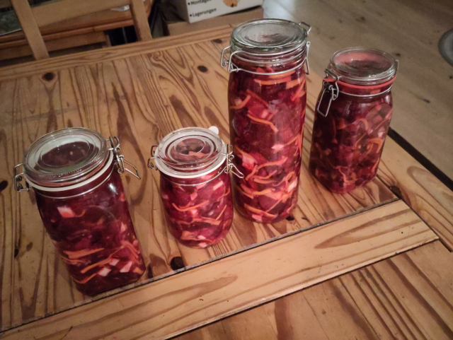 Four very big jars of red kimchi.