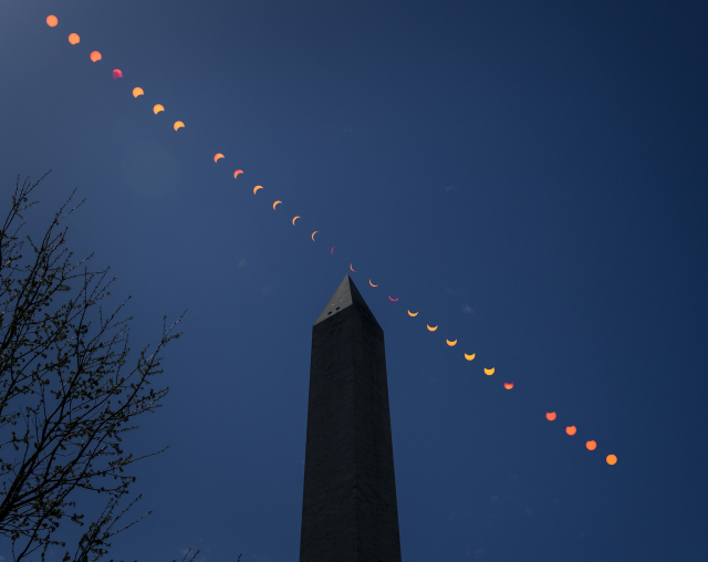 Composite image of multiple exposures over the Washington Monument.
