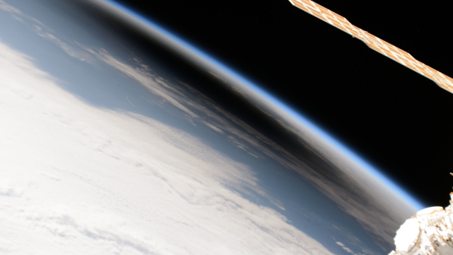 The Moon's shadow, or umbra, is pictured covering portions of the Canadian provinces of Quebec and New Brunswick and the American state of Maine in this photograph from the International Space Station as it soared into the solar eclipse from 261 miles above.