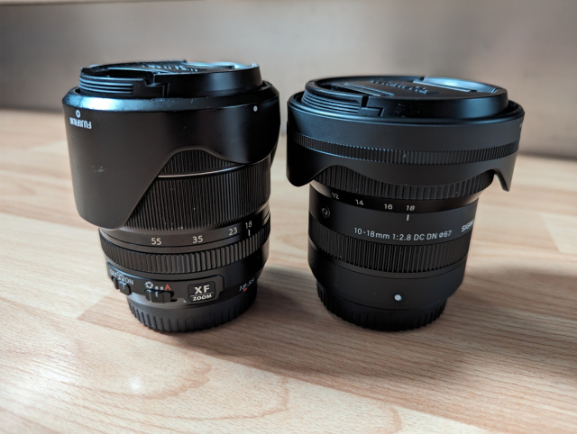 Two lenses. On the left is the Fuji kit lens. On the right is the Sigma 10 - 18 for Fuji.