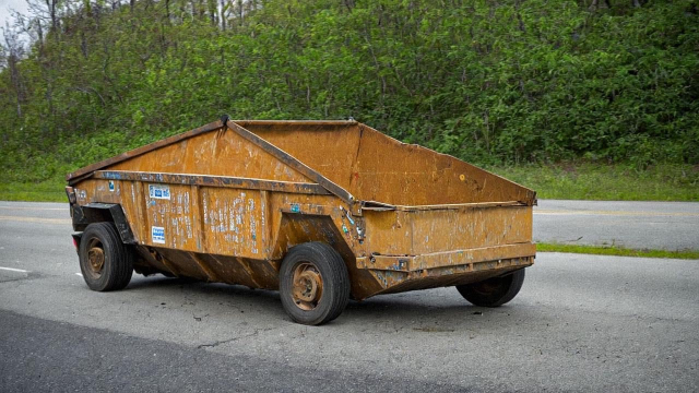 A rusty dumpster.