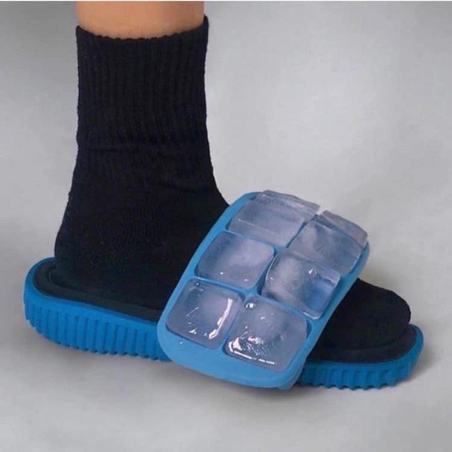 Photo of flip-flops with an ice tray on top