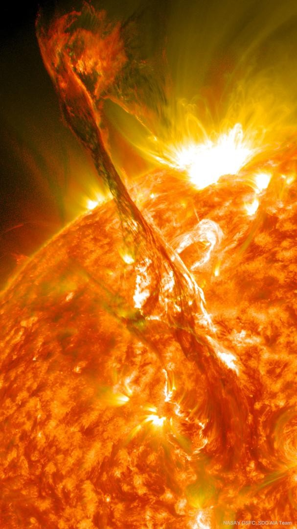 A large filament on the upper left is seen lifting away from the Sun, pictured on the lower right.