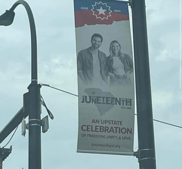 A banner for Juneteenth celebrations in Greenville South Carolina. Pictured is two white people.