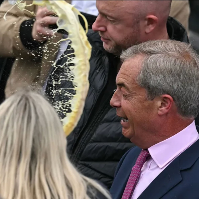 Farage hit by yellow waves of milkshake