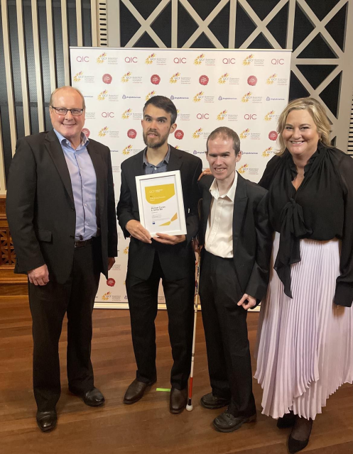 Photo of James, Jamie and Mick from NV Access with Kristin from KDPR at the Queensland Gives Philanthropy Week awards in 2023