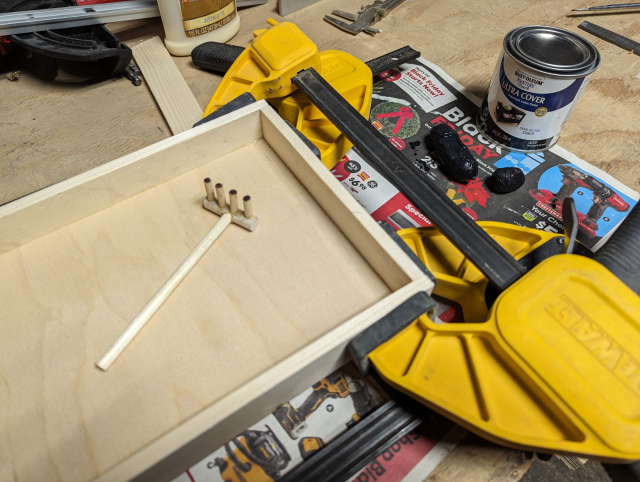 Oh it's a rake! And a wooden box!