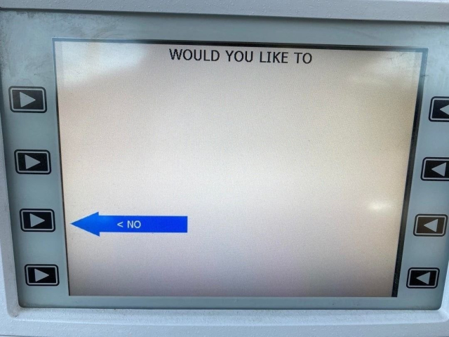 Photo of gas pump or ATM kiosk display that has the prompt "Would you like to" with "No" as the only option below.